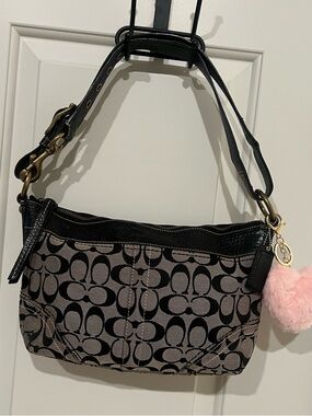 Coach Black Signature Canvas Shoulder Bag with black leather trim and brass